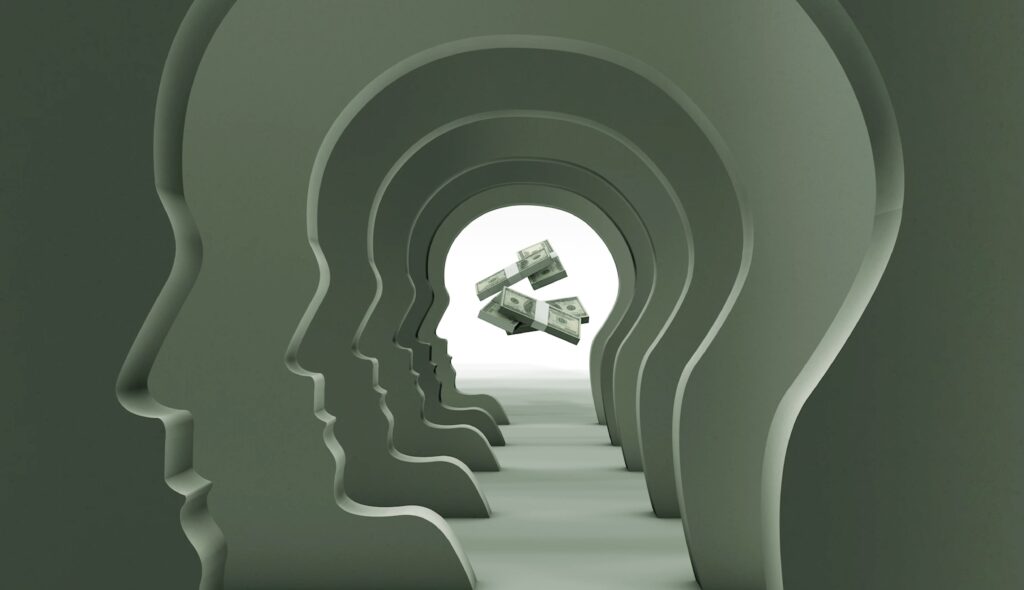 Silhouette profiles form a tunnel, leading to floating dollar bills at the center. The green tones convey a theme of money and introspection.